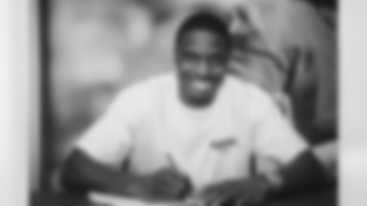 WR A.J. Green smiles during his contract signing.
