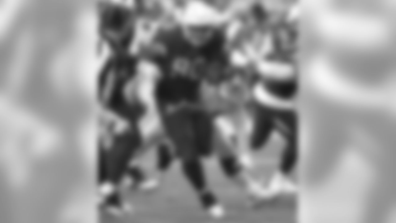 Cardinals DL Robert Nkemdiche scoops up a Giants fumble