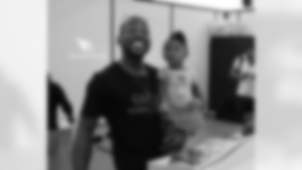 CB Patrick Peterson smiles while holding his daughter, Paityn