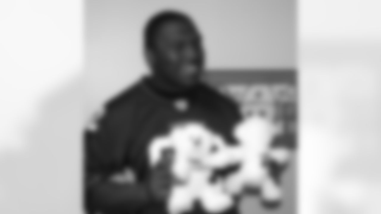 Dan Williams shows off his personalized bears