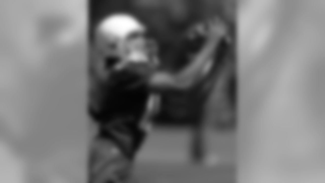 2004: WR Larry Fitzgerald catches a pass