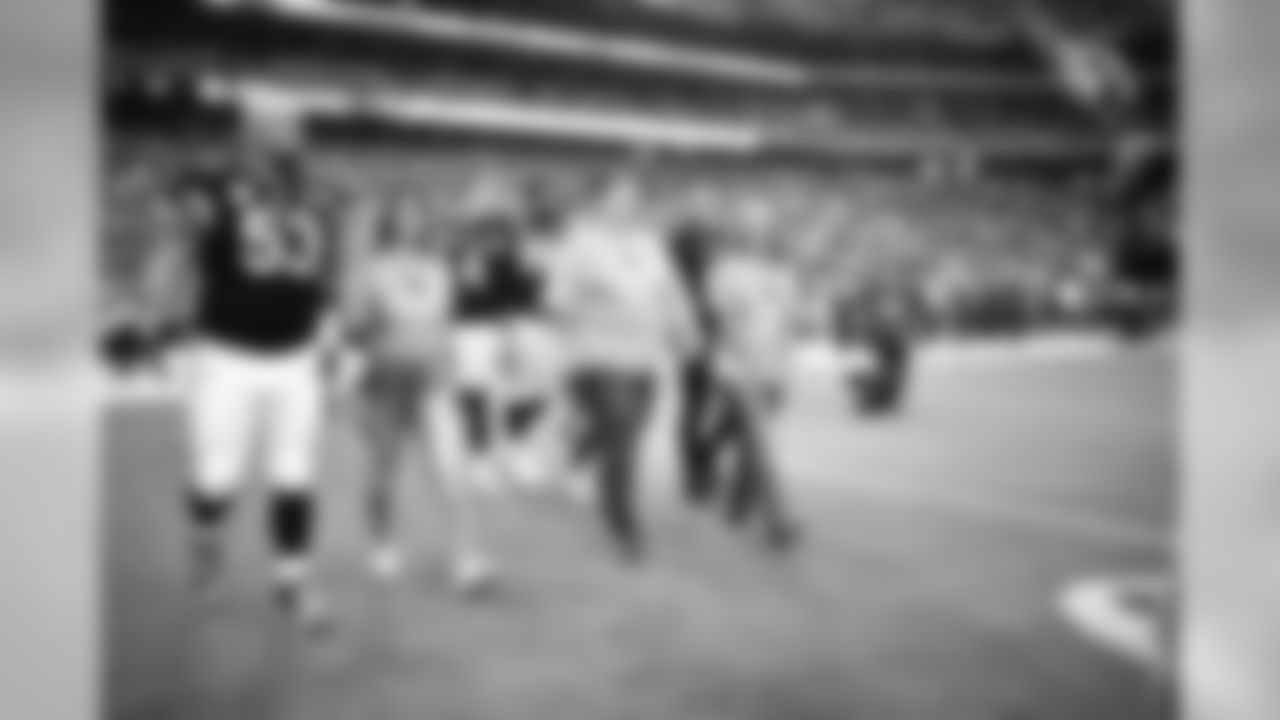 Images from halftime of the Falcons game, where Cardinals cheerleaders performed with cancer survivors and their caregivers to raise awareness for early detection and prevention