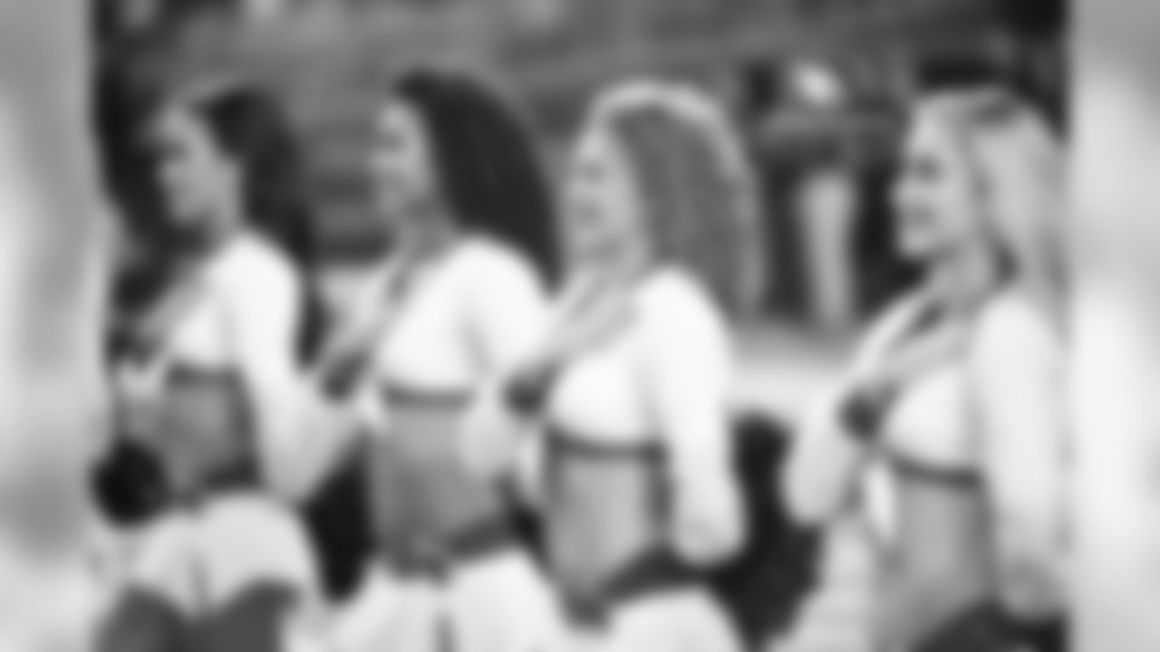 Images of the Cardinals cheerleaders during the first half of the preseason opener against the Chargers