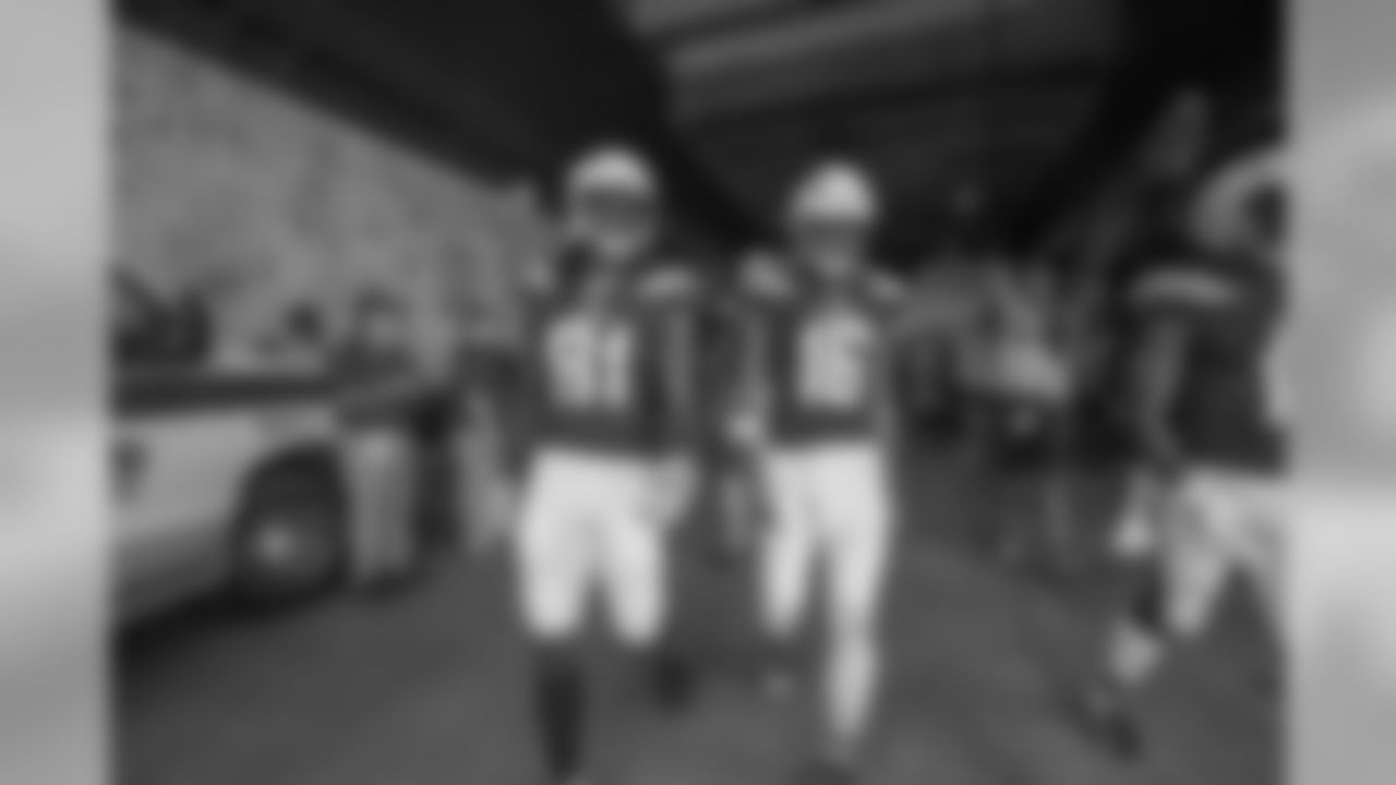 Mike Williams and Tyrell Williams walk out to the field at LA Memorial Coliseum before the Bolts' matchup against the LA Rams.