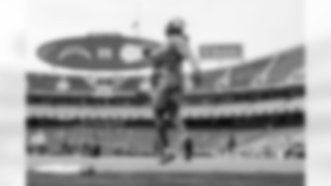 The Los Angeles Chargers prepare to play against the Kansas City Chiefs at Geha Field at Arrowhead Stadium on September 15, 2022 in Kansas City, Missouri.