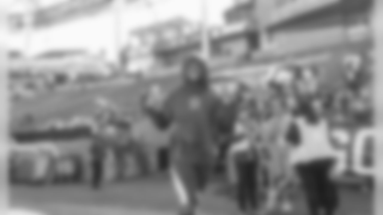 Jatavis Brown poses while walking out to warmups before the Week 11 contest against the Denver Broncos.