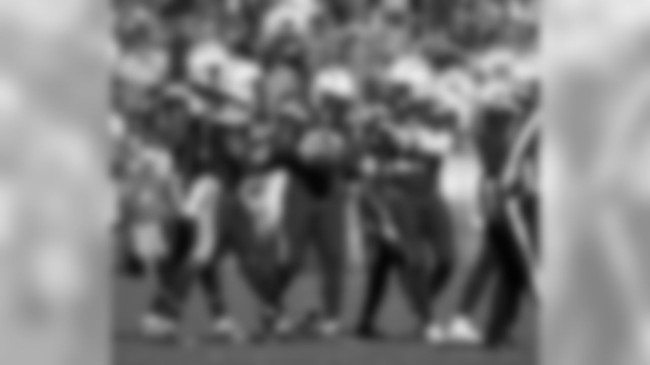 Desmond King celebrates his second interception of the day during the Week 6 matchup against the Cleveland Browns.
