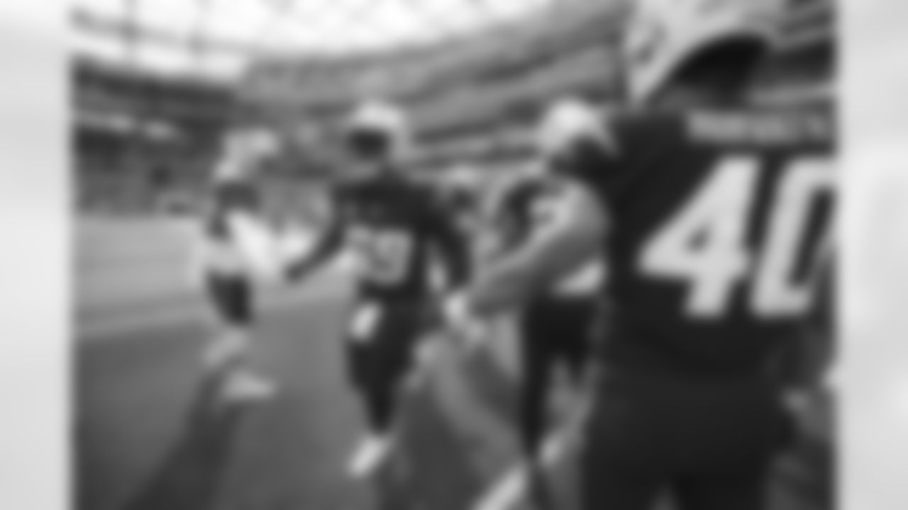 The Los Angeles Chargers prepare to play against the Seattle Seahawks at SoFi Stadium on October 23, 2022 in Inglewood, California.