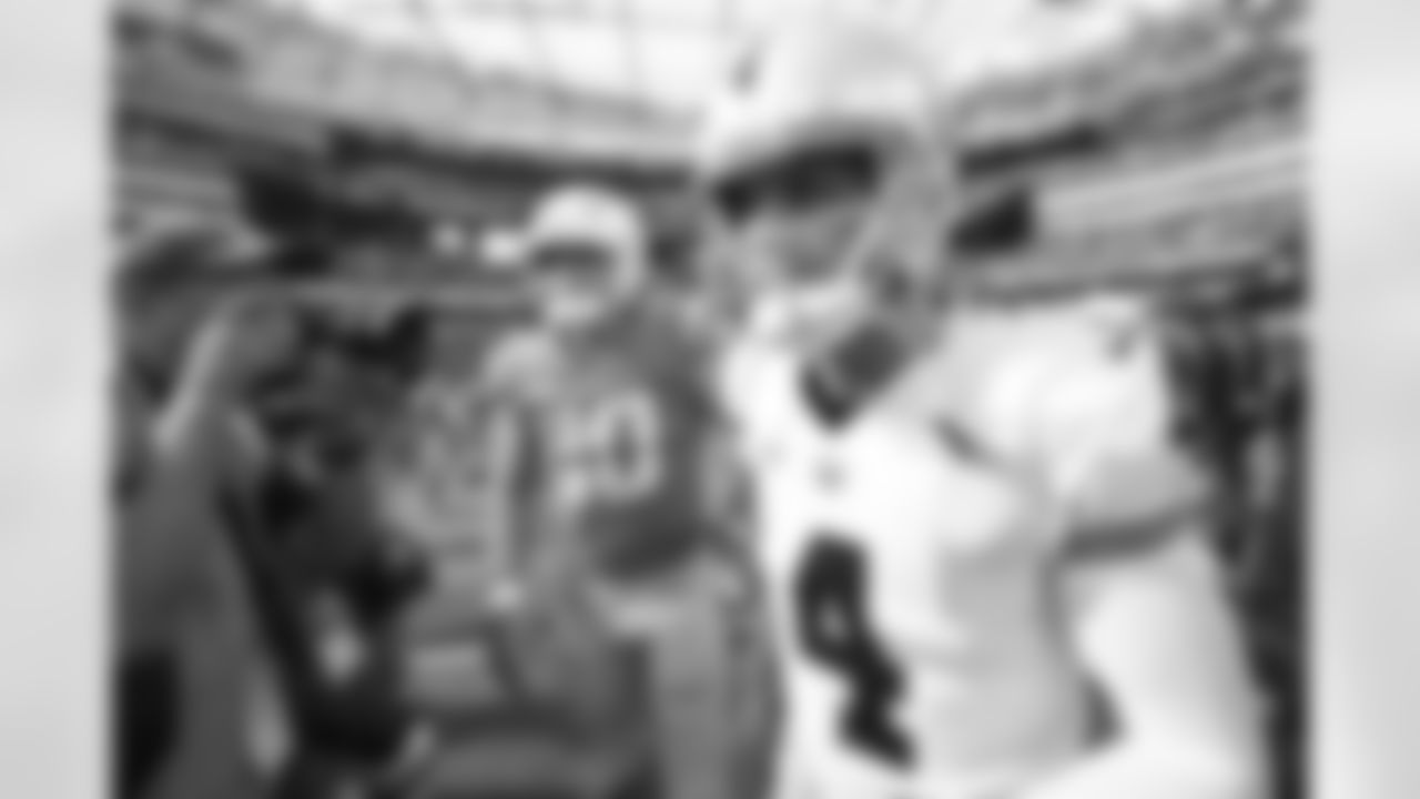 The Los Angeles Chargers celebrate their 24-19 victory over the Las Vegas Raiders at SoFi Stadium on September 11, 2022 in Inglewood, California.