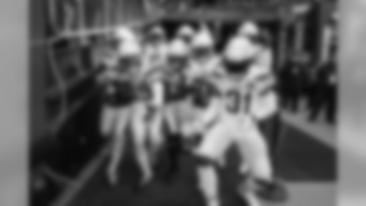 The Bolts pose outside the tunnel before the Divisional Round matchup against the New England Patriots at Gillette Stadium.