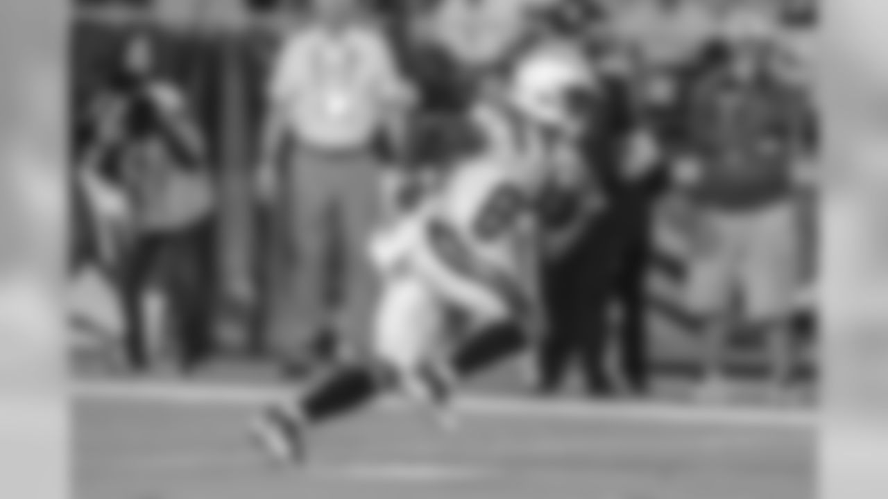 J.J. Jones rushing during the Chargers' first preseason game versus the Arizona Cardinals.
