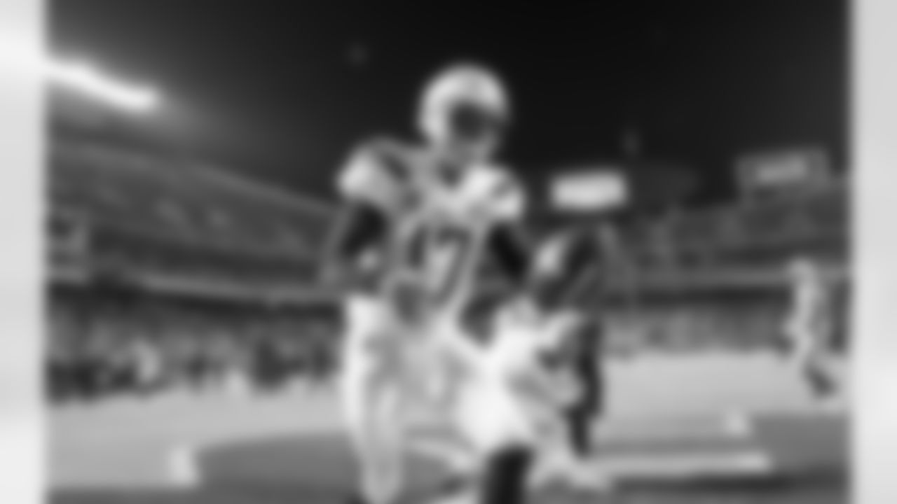 Philip Rivers warms up before the Thursday night matchup against the Kansas City Chiefs at Arrowhead Stadium.