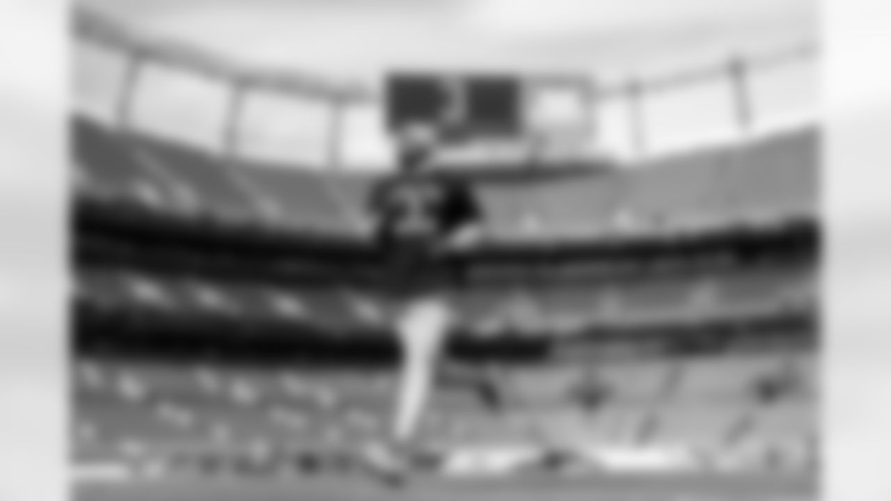 The Los Angeles Chargers prepare to play against the Denver Broncos at Empower Field at Mile High on January 8, 2023 in Denver, Colorado.