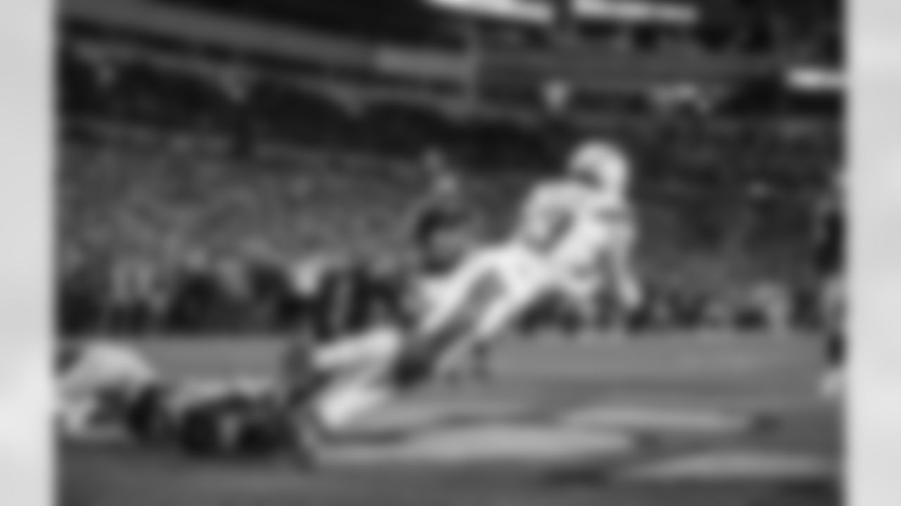 Keenan Allen taking hold of the ball after a near miss interception from the Steelers for a touchdown during the Week 13 matchup against the Pittsburgh Steelers.