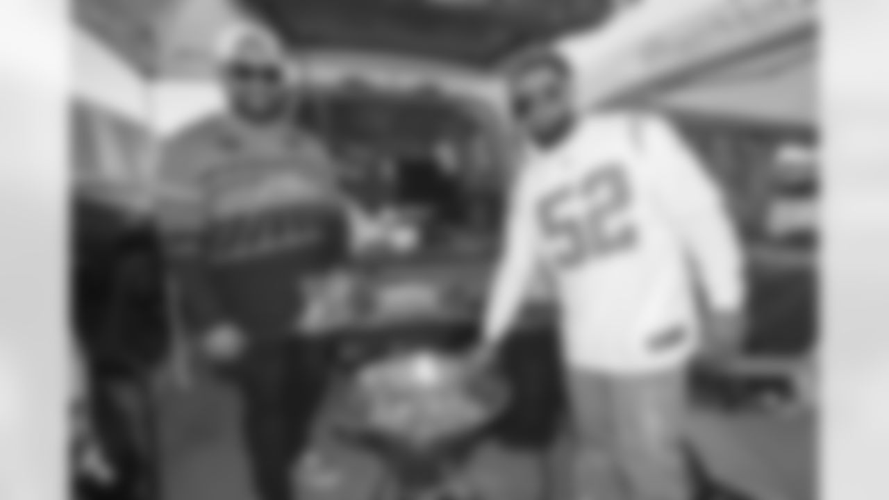 Bolt Fam show up at SoFi Stadium to root against the Tennessee Titans on December 11, 2022 in Inglewood, California.
