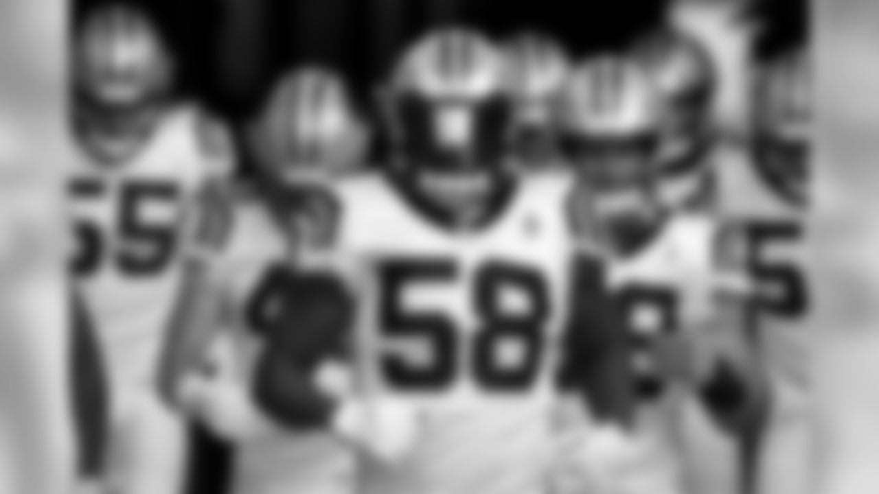 Carolina Panthers linebacker Thomas Davis (58) takes the field with teammates prior to an NFL football game against the Buffalo Bills, Thursday, Aug. 9, 2018, in Orchard Park, N.Y. (AP Photo/Jeffrey T. Barnes)