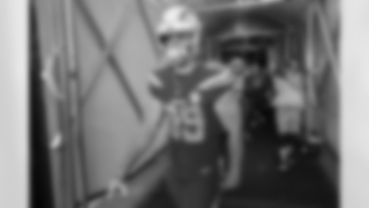 Joey Bosa walks out to the field before the Week 12 matchup against the Arizona Cardinals.