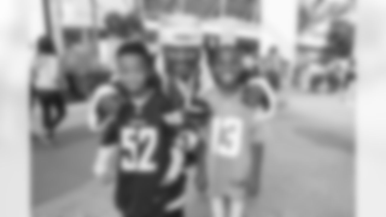 Bolt Fam show up at SoFi Stadium to root against the Tennessee Titans on December 11, 2022 in Inglewood, California.