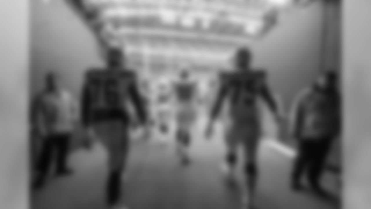 Russell Okung and Michael Schofield walk through the tunnel out to the field before the Week 9 matchup against the Seattle Seahawks at CenturyLink Field.