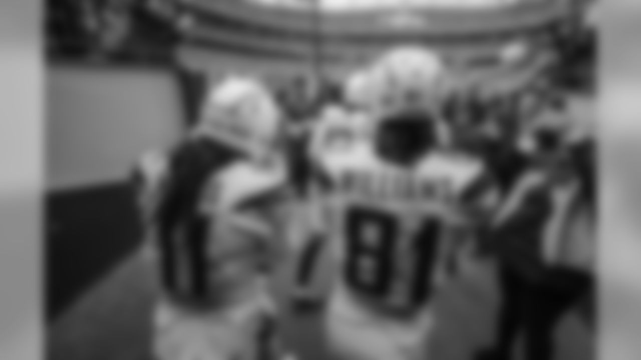 Geremy Davis and Mike Williams walk out to the field to warm up before the Week 17 contest against the Denver Broncos.