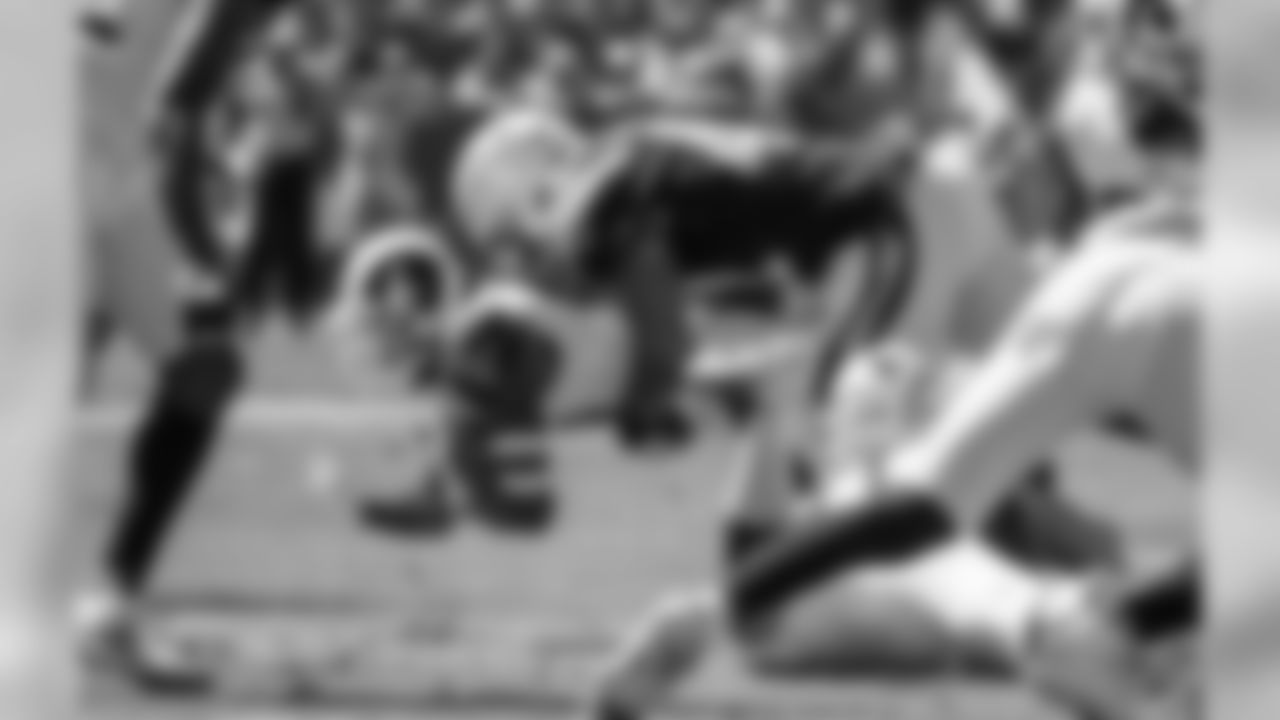 Uchenna Nwosu makes a tackle during the Bolts' Week 3 matchup against the Rams at the LA Memorial Coliseum.
