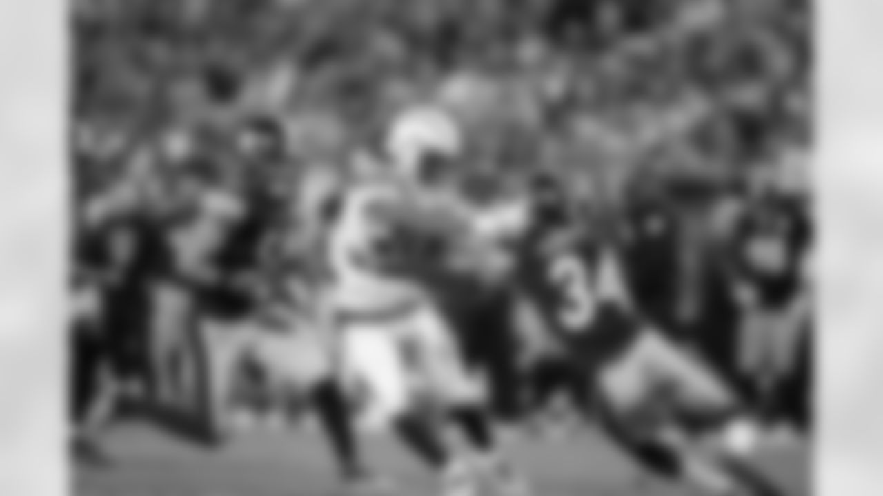 Justin Jackson avoiding a tackle by Terrell Edmunds during the Week 13 matchup against the Pittsburgh Steelers.