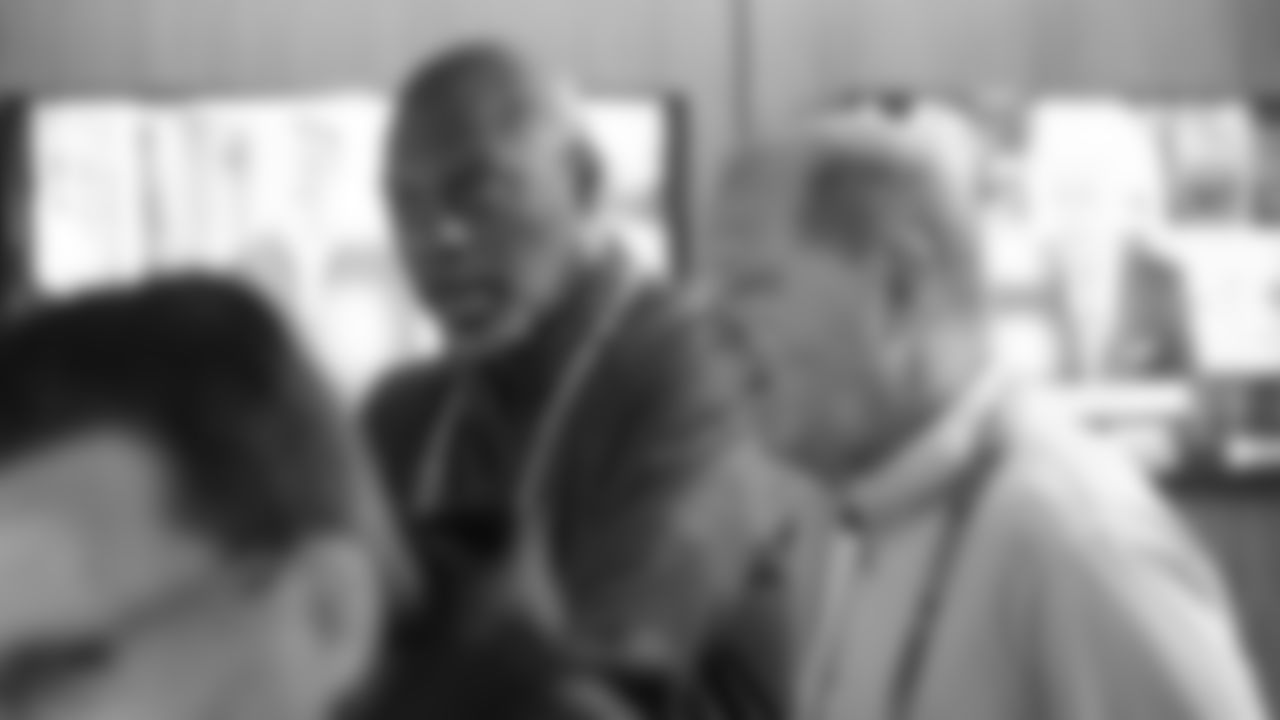 Head coach Anthony Lynn is seen alongside tight end coach Rip Scherer inside the Chargers viewing suite at the 2019 NFL Scouting Combine at Lucas Oil Stadium in Indianapolis.
