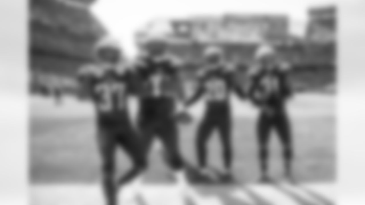 Jahleel Addae, Damion Square, Desmond King and Adrian Phillips pose for a picture after one of King's interception during the Week 6 matchup against the Cleveland Browns.
