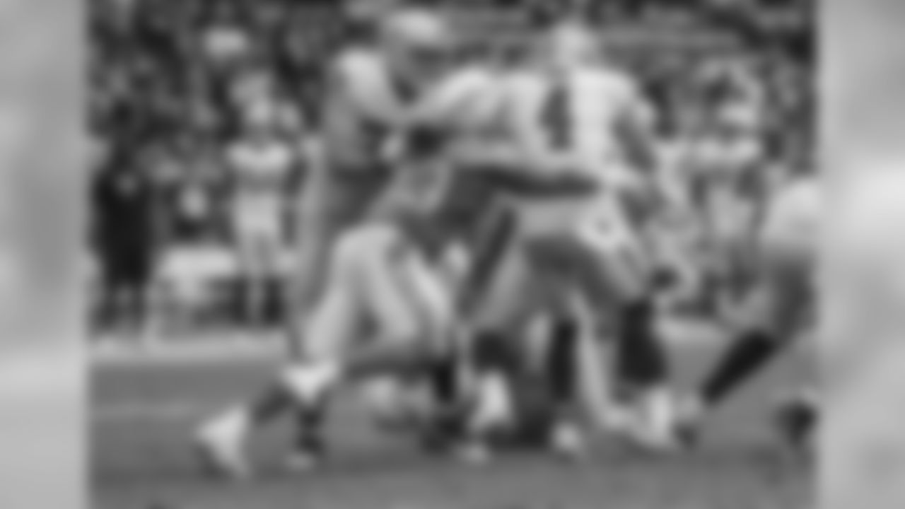 Darius Philon sacks Raiders QB Derek Carr during the Bolts' Week 5 matchup against the Oakland Raiders at ROKiT Field at StubHub Center.