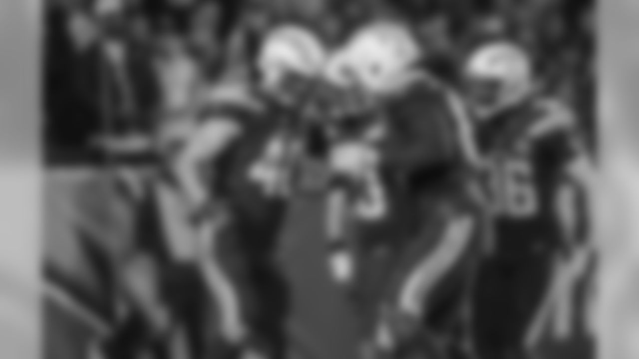 Nick Dzubnar celebrates keeping the punt out of the end zone during the Week 16 matchup against the Baltimore Ravens at ROKiT Field at StubHub Center.