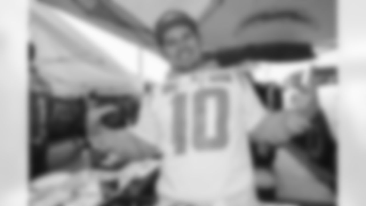 Bolt Fam show up at SoFi Stadium to root against the Miami Dolphins on December 11, 2022 in Inglewood, California.