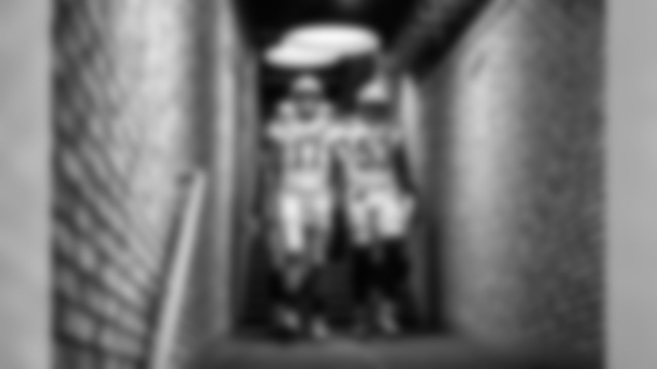 6 - Tunnel Vision: "The stairs leading to the field in Oakland are steep and lit by a few lights. I like this frame because it shows lines of the brick with the soft glow coming from the overhead lights."