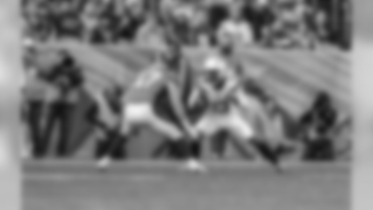 Keenan Allen looks to run downfield after catching a pass during the Week 17 contest against the Denver Broncos.