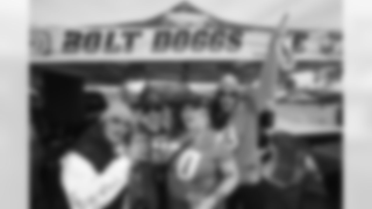 Bolt Fam show up at SoFi Stadium to root against the Miami Dolphins on December 11, 2022 in Inglewood, California.