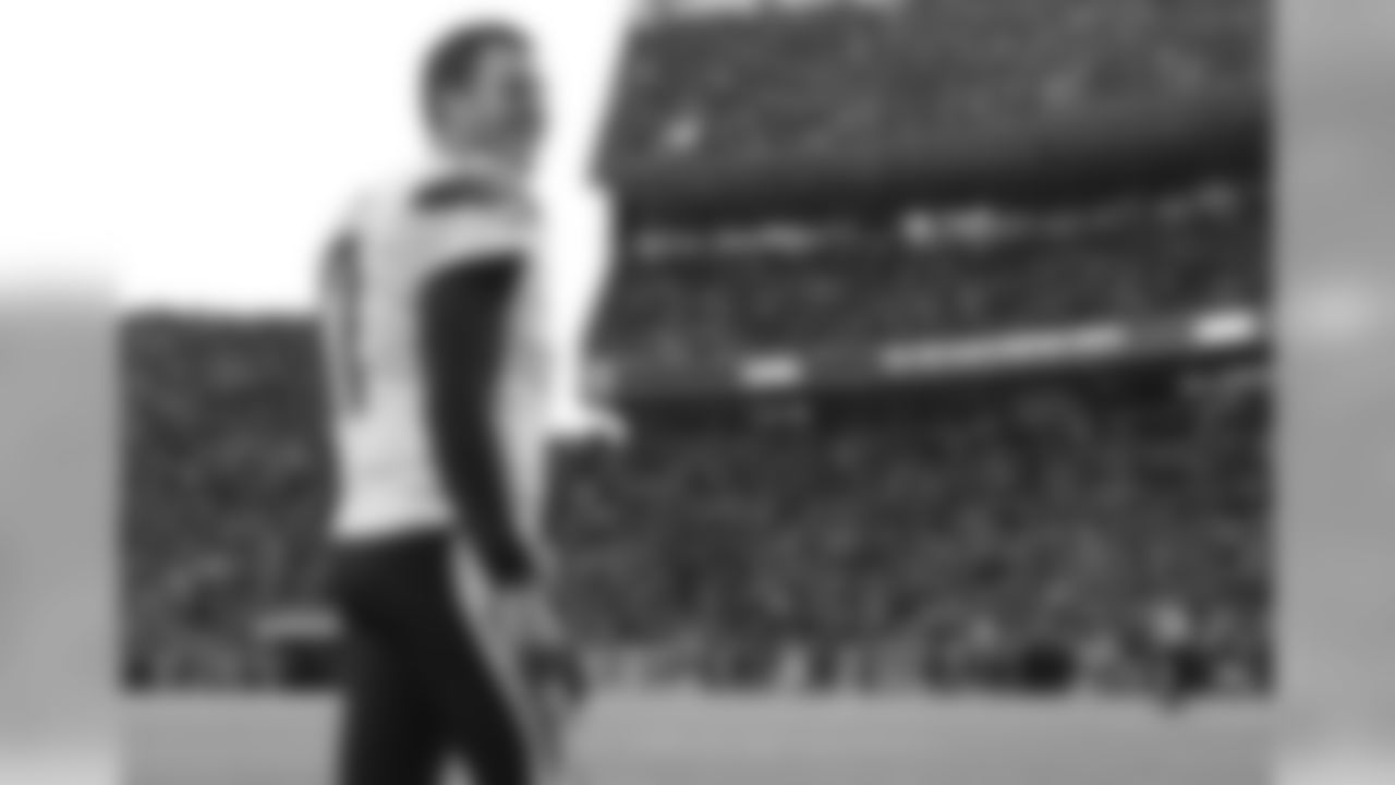 San Diego Chargers quarterback Philip Rivers smailes on the sideline during the second half in an NFL football game against the Denver Broncos, Sunday, Jan. 3, 2016, in Denver. (AP Photo/David Zalubowski)