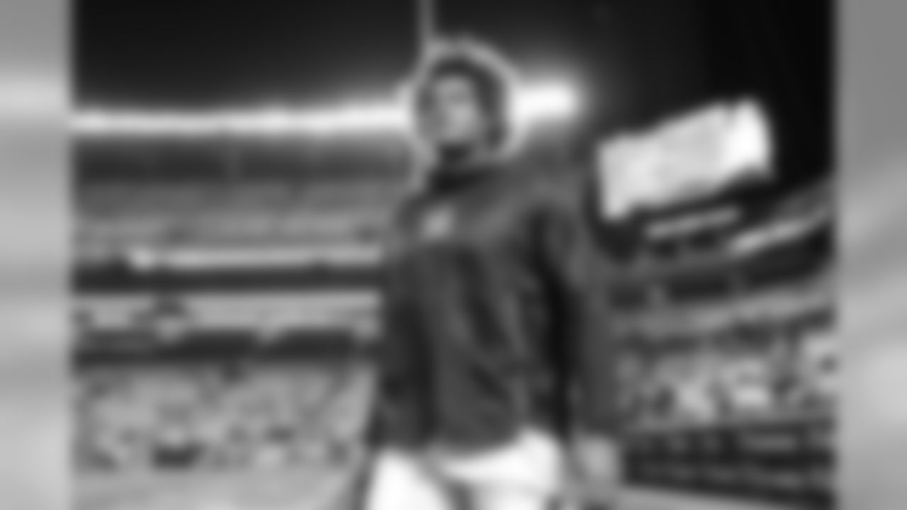 Isaac Rochell walks out to the field to warm up before the Week 13 matchup against the Pittsburgh Steelers at Heinz Field.