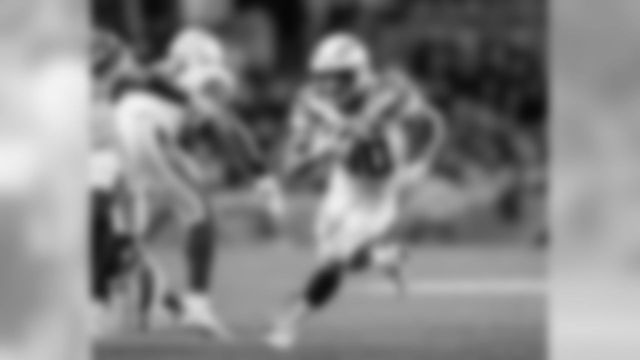 Austin Ekeler running the ball during the Week 13 matchup against the Pittsburgh Steelers.