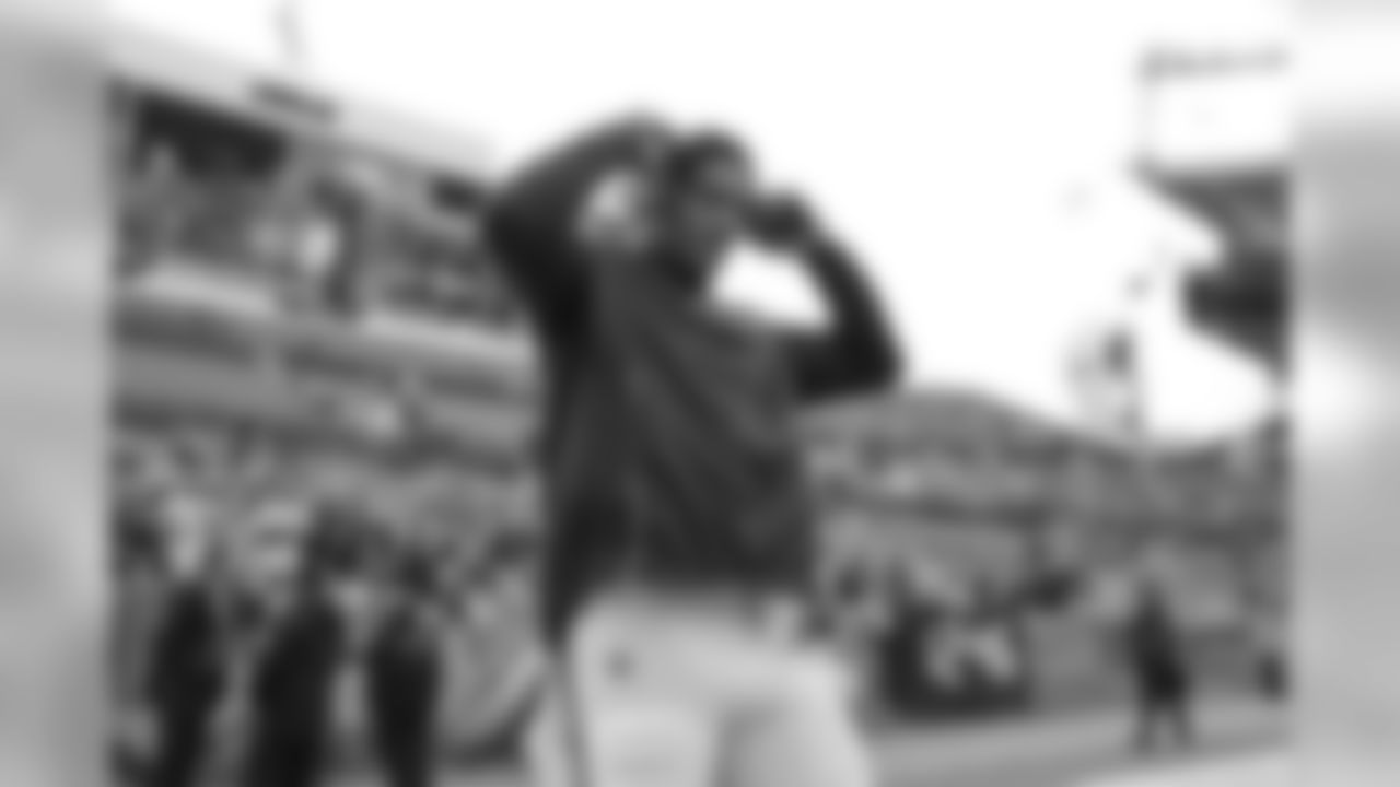 Isaac Rochell walks out to the field to warm up before the Week 17 contest against the Denver Broncos.