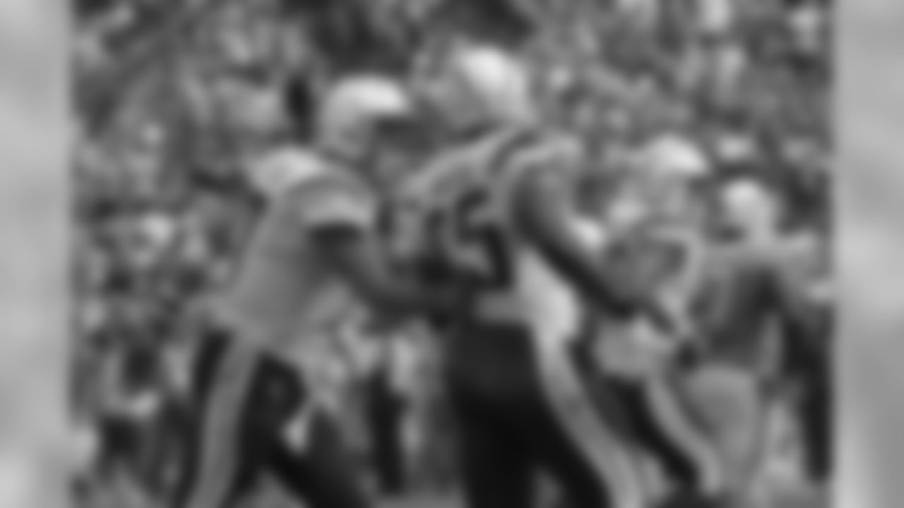 Los Angeles Chargers tight end Antonio Gates (85) celebrates his touchdown catch with teammate quarterback Philip Rivers (17) during the second half of an NFL football game against the Miami Dolphins Sunday, Sept. 17, 2017, in Carson, Calif. With the catch, Gates breaks the record previously held by Tony Gonzalez (111) for most touchdown receptions by a tight end in NFL history.(AP Photo/Mark J. Terrill)