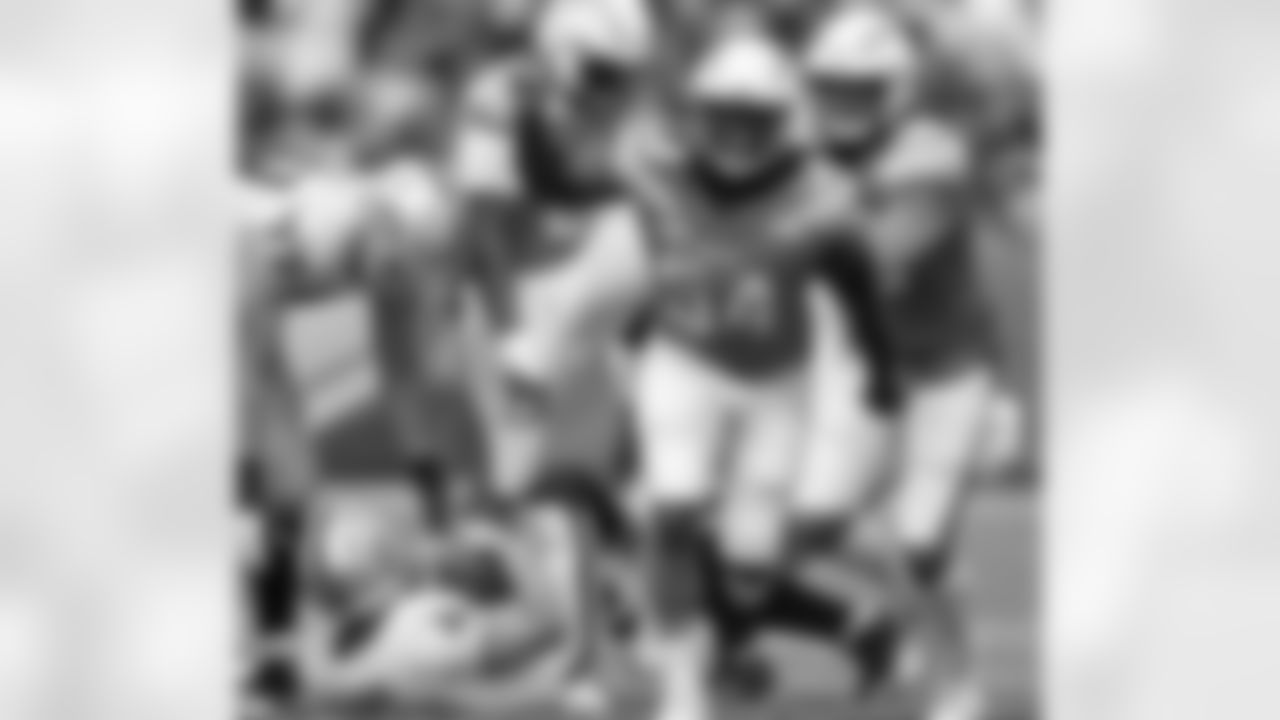 Melvin Ingram celebrates after sacking Oakland Raiders quarterback Derek Carr at StunHub Center on Sunday, October 07, 2018.