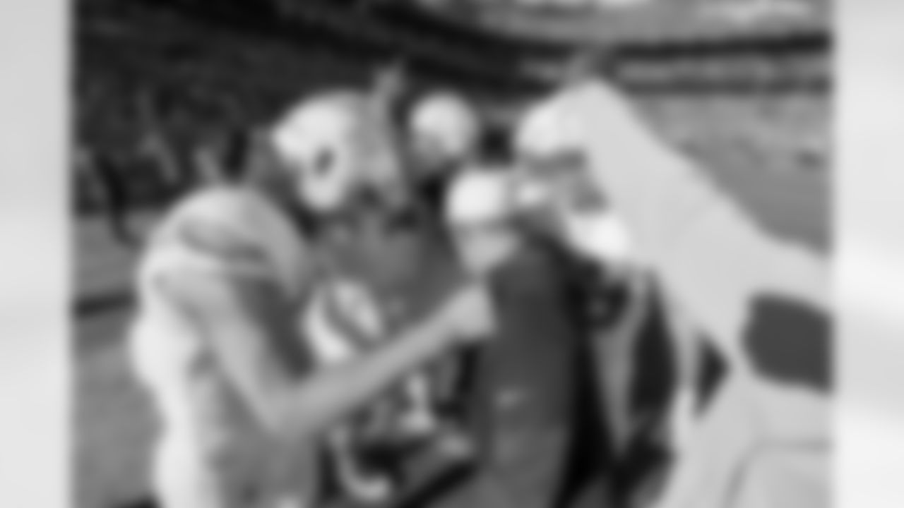 The Los Angeles Chargers prepare to play against the Denver Broncos at Empower Field at Mile High on January 8, 2023 in Denver, Colorado.