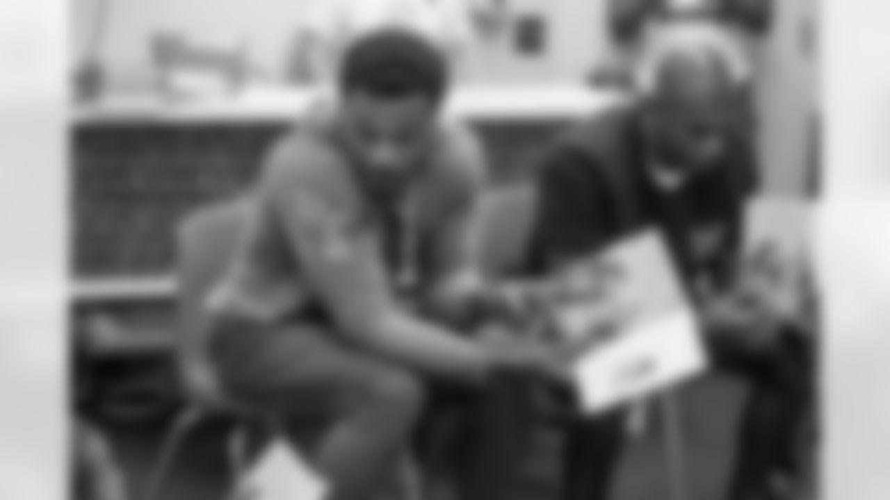 The Los Angeles Chargers participate in the "Bolts Book Club" on Tuesday, July 18, 2023 at Watts/Willowbrook Boys & Girls Club in Los Angeles, CA.