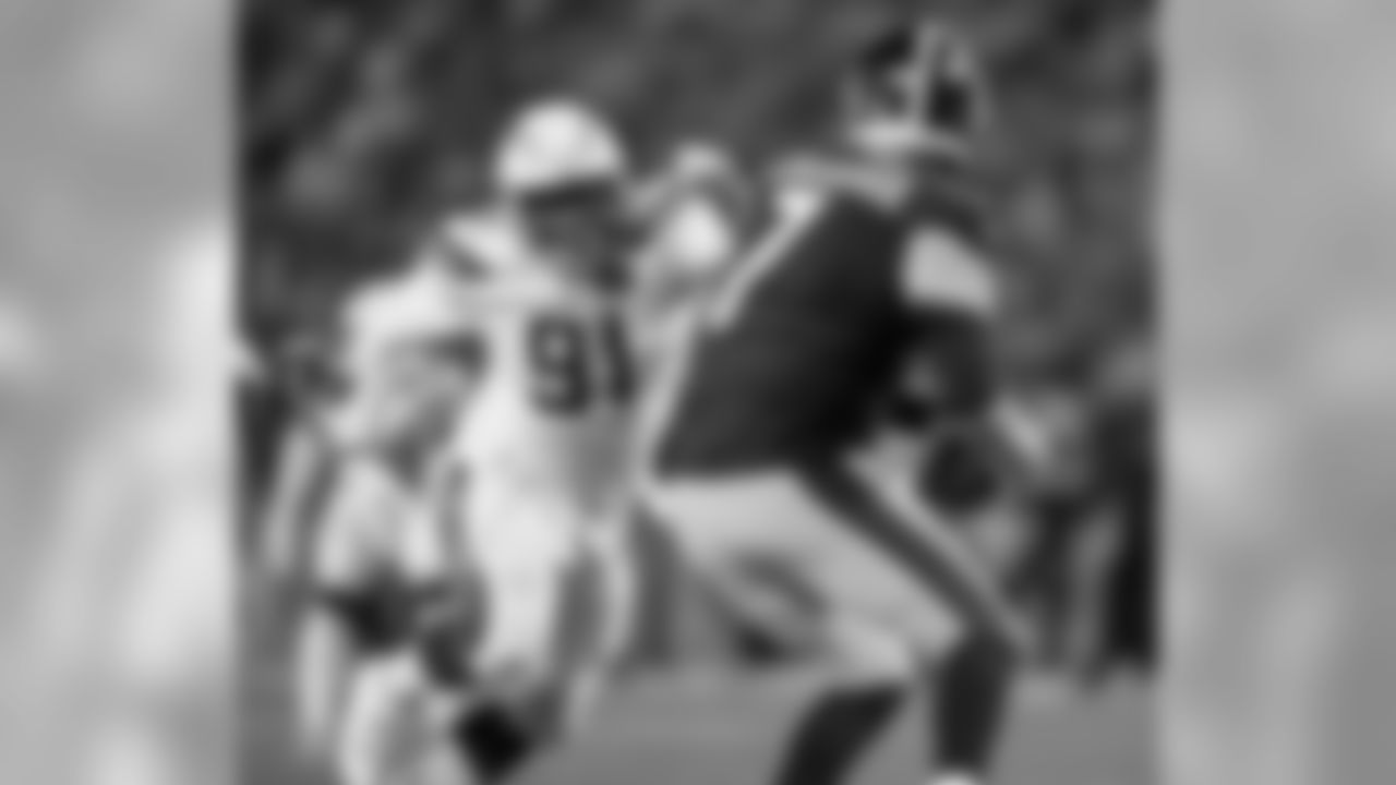 Justin Jones moving in to sack Ben Roethlisberger during the Week 13 matchup against the Pittsburgh Steelers.