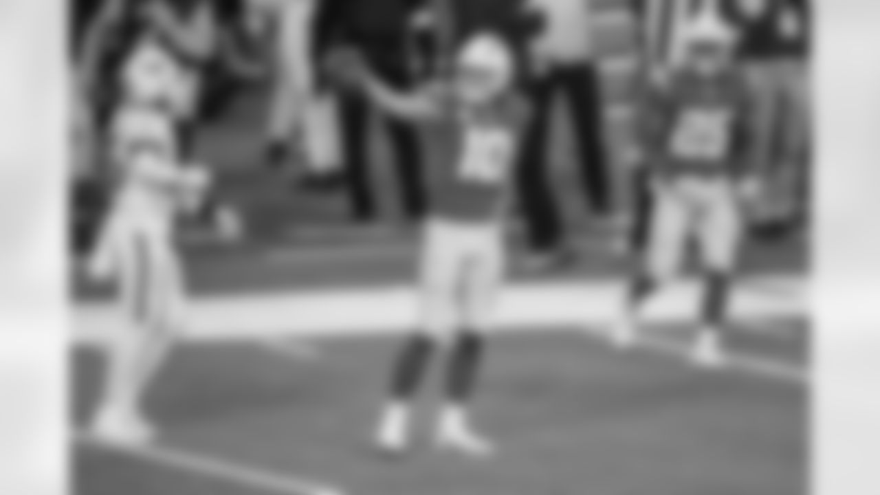 FULLY LOADED FIRST DOWN - Through his three years in the league, Justin Herbert has kept it pretty cool, calm, and collected on the field. That changed for a moment in Week 14 when the QB ran for a first down on 3rd-and-8 with just over five minutes to play. He then stood up and gave the definitive first down motion. The play made Chargers fans harken back to when Philip Rivers did a similar celebration in the playoffs against the Baltimore Ravens showing even QBs can get in on the fun every once in a while. - Noel Vasquez/Los Angeles Chargers