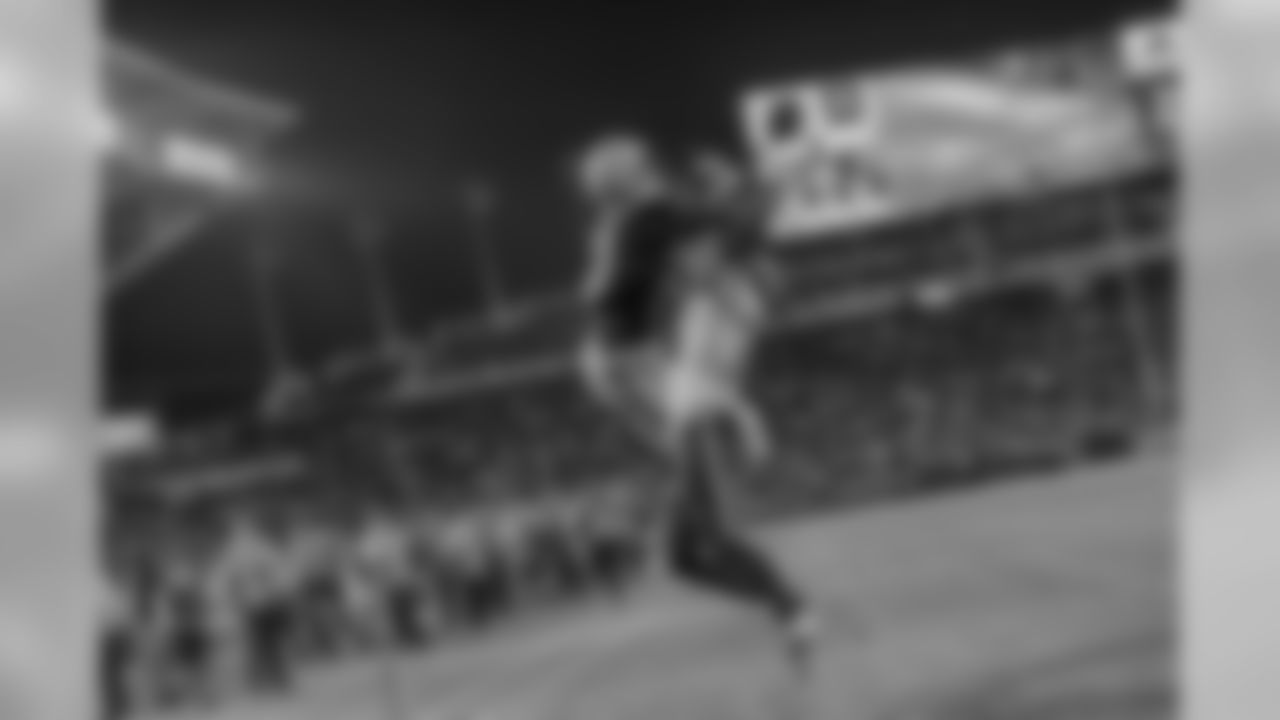 Mike Williams leaps to make a touchdown during the Chargers' preseason home opener against the Seattle Seahawks at ROKiT Field at StubHub Center.
