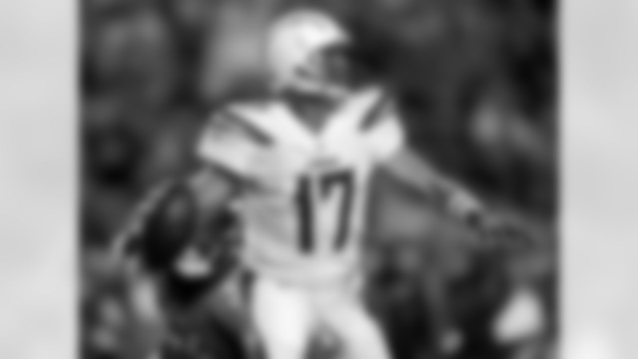 Los Angeles Chargers quarterback Philip Rivers (17) scrambles against the Denver Broncos during the first half of an NFL football game, Monday, Sept. 11, 2017, in Denver. (AP Photo/David Zalubowski)