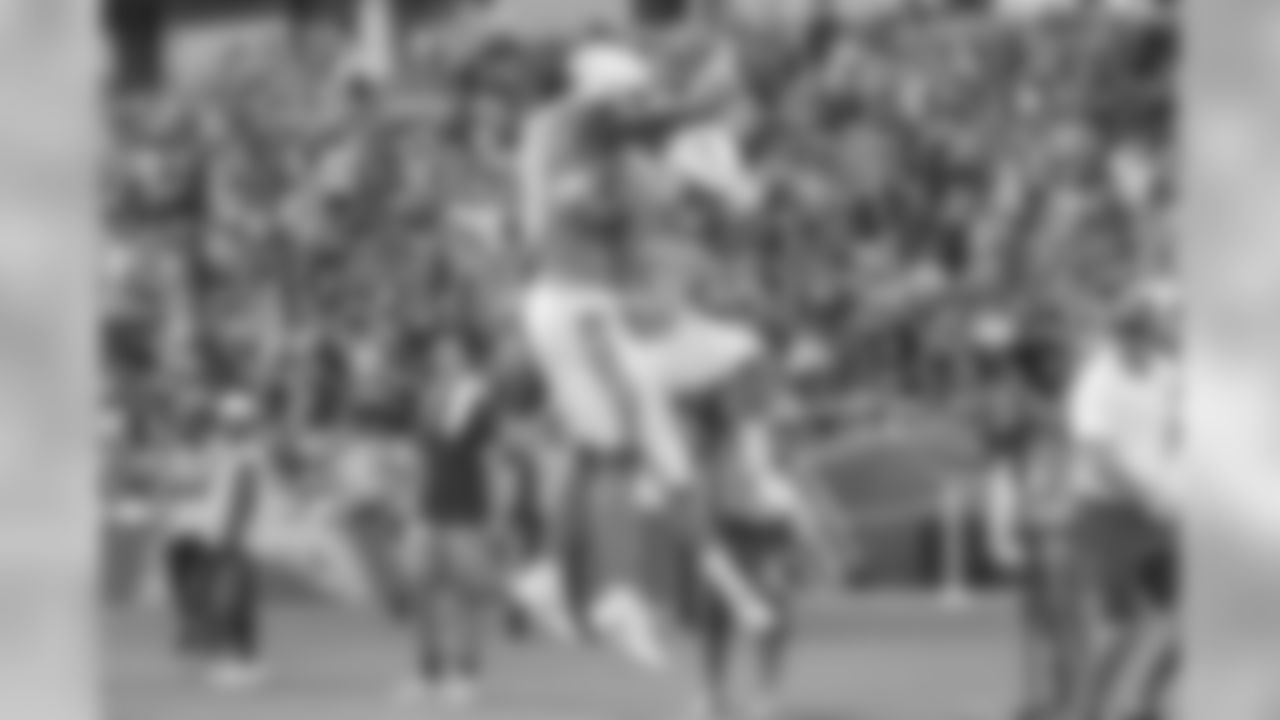 Mike Williams and Austin Ekeler celebrate Ekeler's touchdown during the Bolts' Week 5 matchup against the Oakland Raiders at ROKiT Field at StubHub Center.