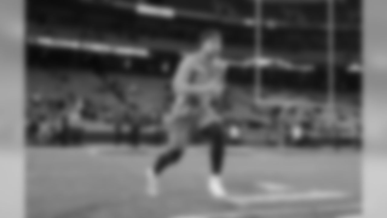 Joey Bosa warms up at Arrowhead Stadium before the Thursday night matchup against the Kansas City Chiefs.
