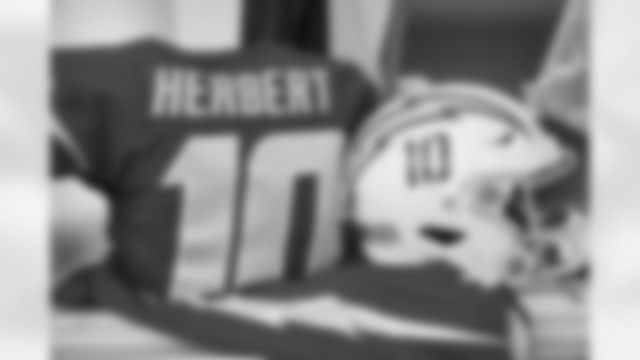 The Los Angeles Chargers prepare to play against the Tennessee Titans at SoFi Stadium on December 18, 2022 in Inglewood, California.