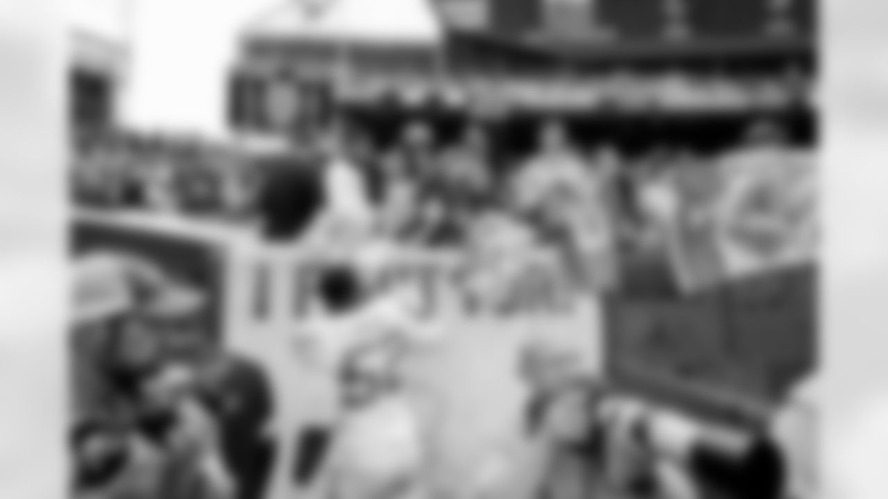 The Los Angeles Chargers celebrate their 30-28 victory over the Cleveland Browns at FirstEnergy Stadium on October 9, 2022 in Cleveland, Ohio.